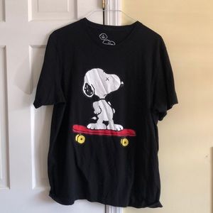 Kaws x uniqlo skate boarding snoopy